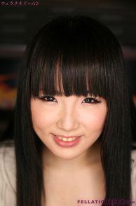 Smiling Japanese Gal With Dark Eyes