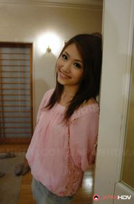 Sweet Smiling Asian Beauty Indoors