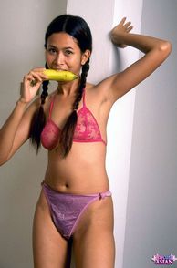 Pigtails Asian In Panties Biting A Banana