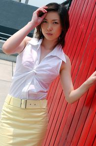 Nice Japanese Woman In Her Skirt And Top